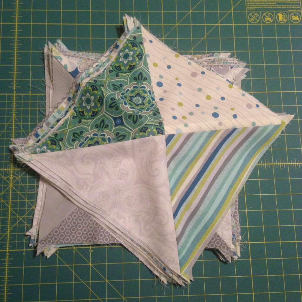 Lots of half square triangles. The final blocks to be arranged in the quilt! - making progress here at Stacey Sansom Designs